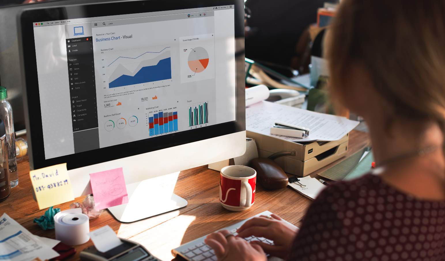 Let us put together the financial systems and reporting you need. An accountant working on a presentation
